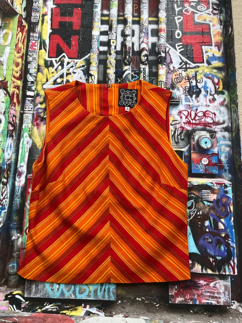Rare Y2K Cynthia Rowley Red, Orange, Yellow Striped Top. Back zip. Fully lined.